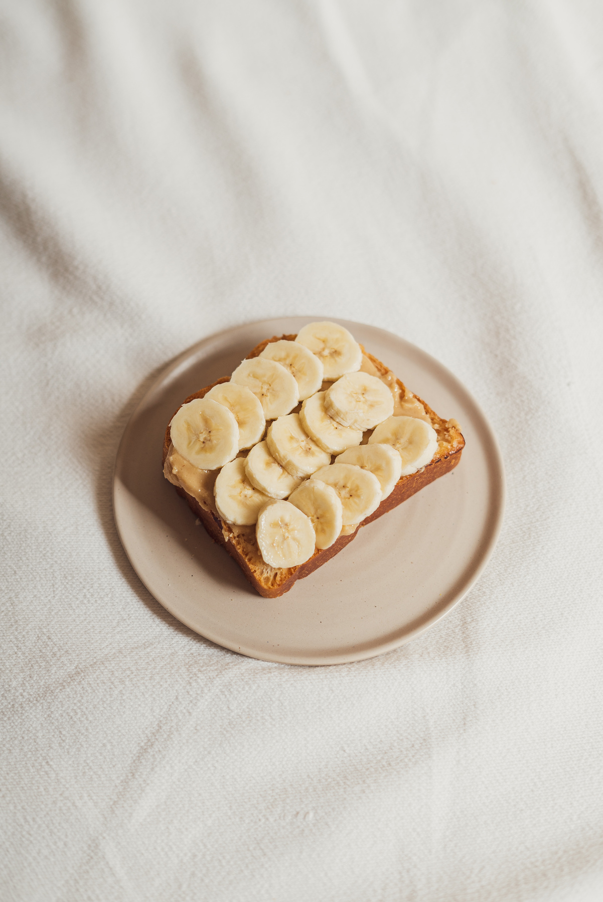 Toast with Bananas on a Plate Flatlay